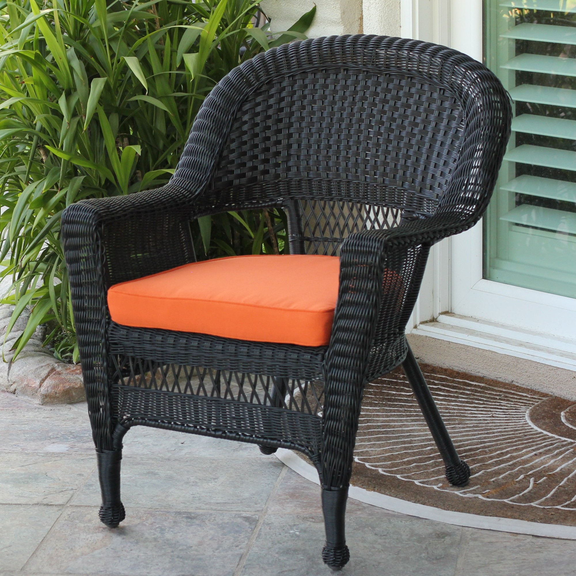 Black Wicker Chair With Orange Cushion