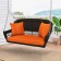 Espresso Resin Wicker Porch Swing with Orange Cushion