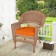 Honey Wicker Chair With Orange Cushion