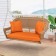 Honey Resin Wicker Porch Swing with Orange Cushion