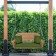 Honey Resin Wicker Porch Swing with Hunter Green Cushion