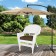 White Wicker Chair With Brown Cushion
