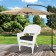 White Wicker Chair With Black Cushion