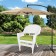 White Wicker Chair With Sage Green Cushion