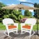 White Rocker Wicker Chair with Orange Cushion-  Set of 2