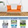 White Resin Wicker Porch Swing with Orange Cushion
