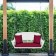 White Resin Wicker Porch Swing with Red Cushion