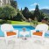 White Wicker Chair And End Table Set With Orange Chair Cushion