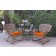 Windsor Honey Wicker Rocker Chair And End Table Set With Orange Chair Cushion
